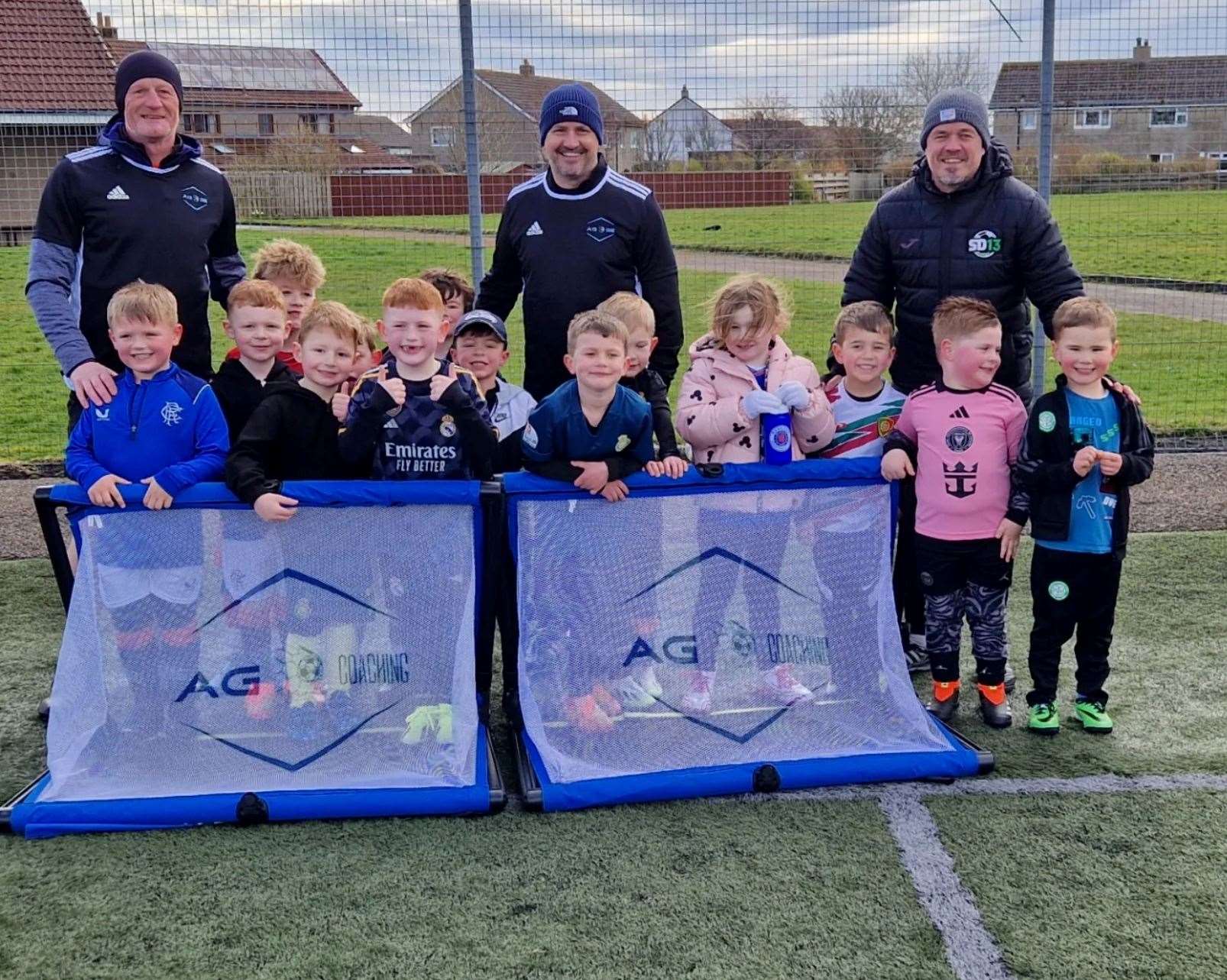 Colin Hendry, Jackie McNamara and Simon Donnelly with the 4-6 age group.