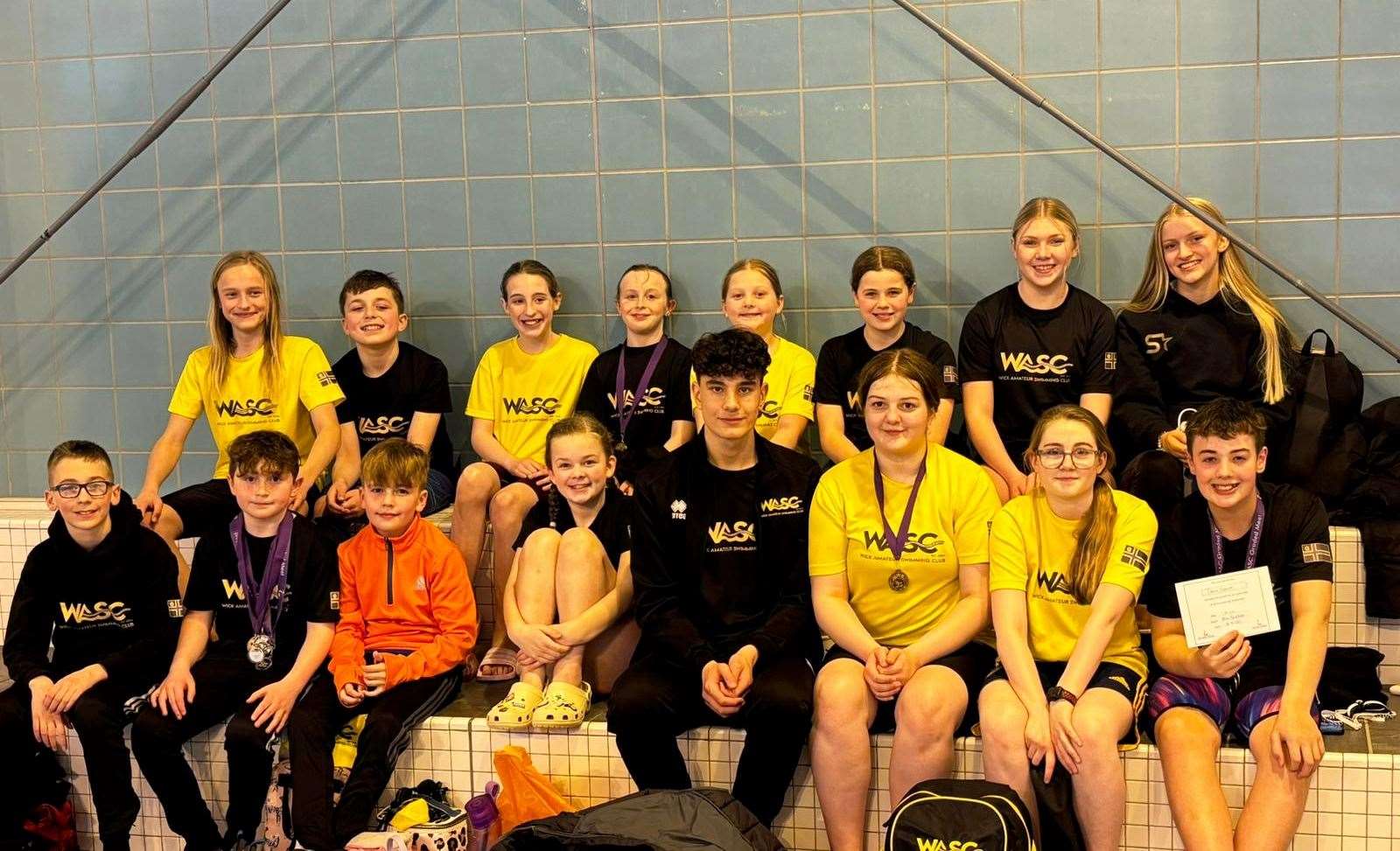 The Wick group at the annual graded meet hosted by Inverness Amateur Swimming Club. They achieved personal bests and a clutch of medals.